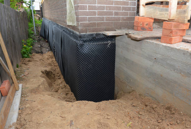 Happy homeowners after waterproofing job in Mohawk
